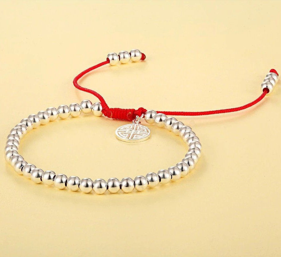 XSpiritual™-  "Lu" Prosperity bracelet made of Silver and Red Rope from Tibet