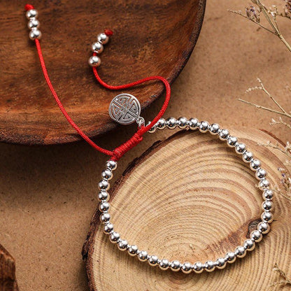 XSpiritual™-  "Lu" Prosperity bracelet made of Silver and Red Rope from Tibet