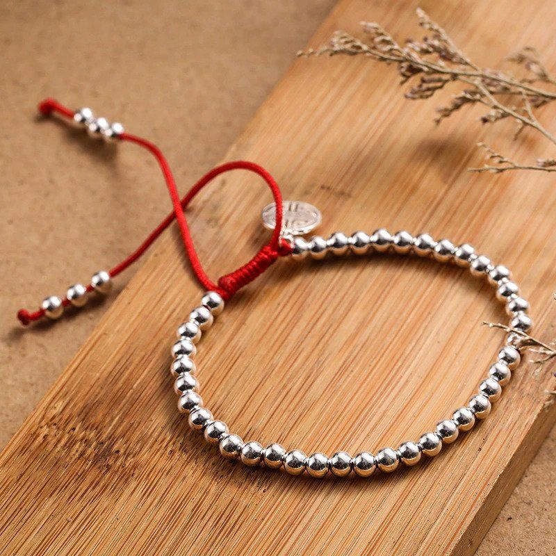 XSpiritual™-  "Lu" Prosperity bracelet made of Silver and Red Rope from Tibet